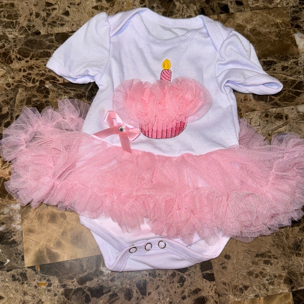 New born birthday girls onesie WORN ONCE